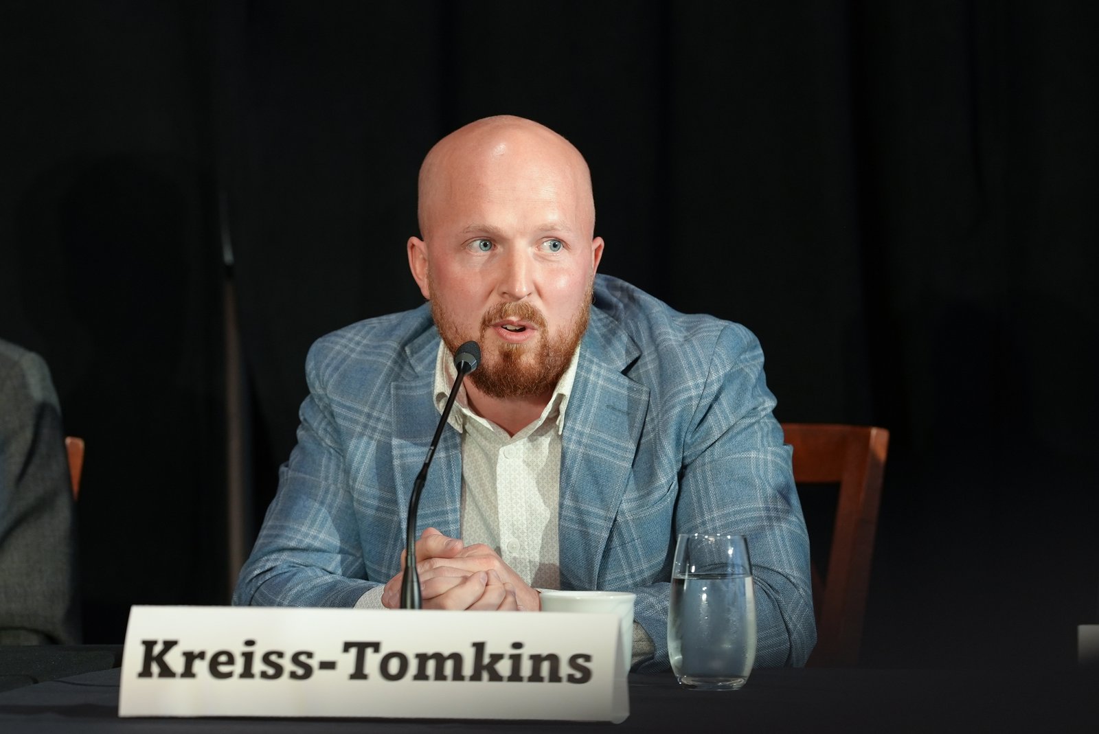 Kreiss-Tomkins speaking at a public event