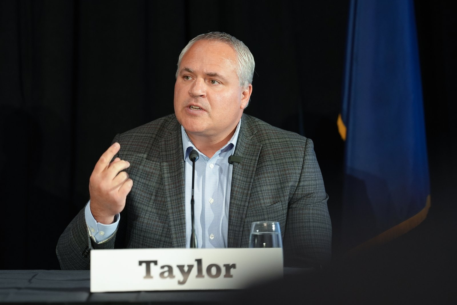 Man speaking at a formal event