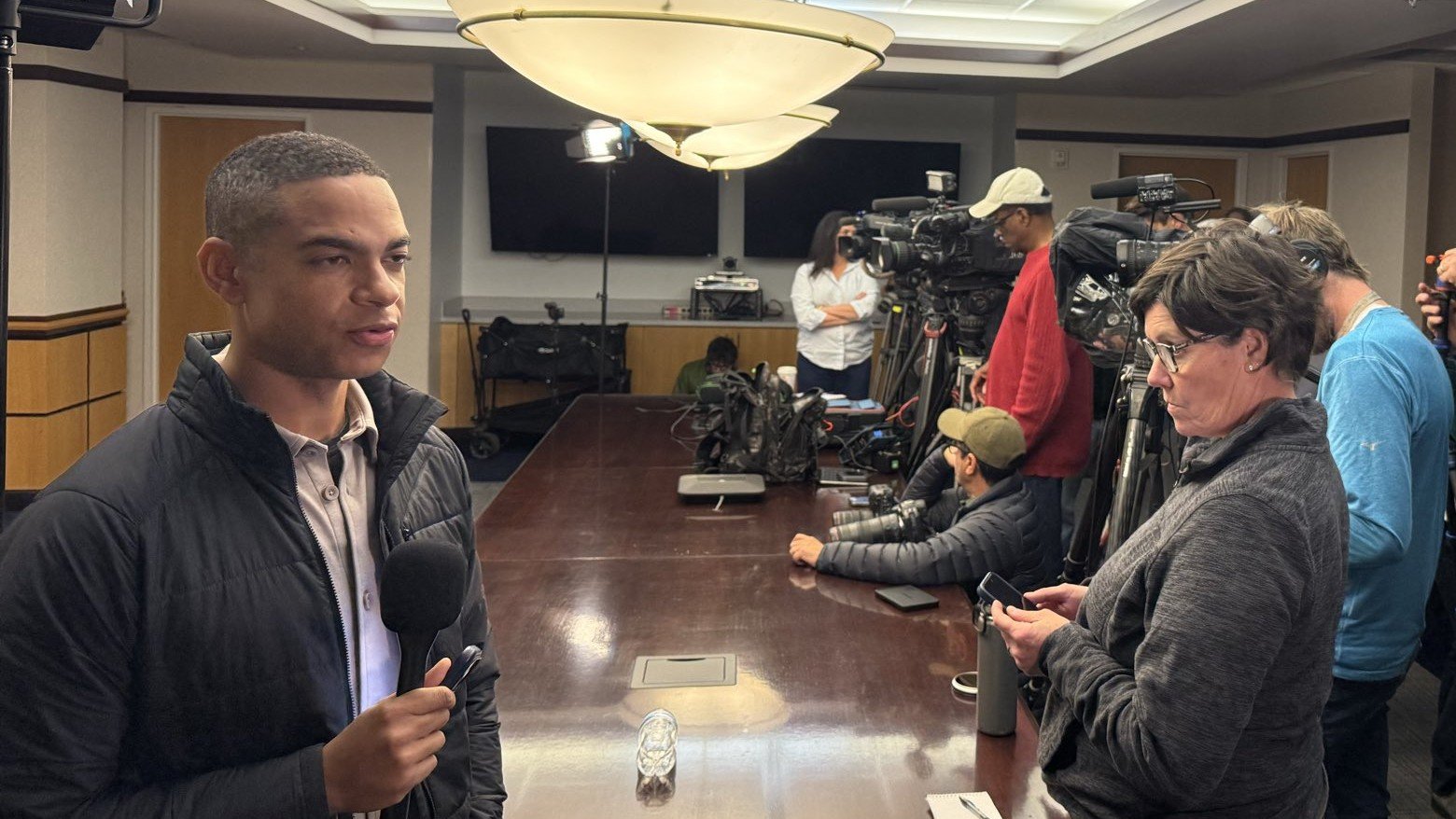 Reporter Conducting Press Conference Interview